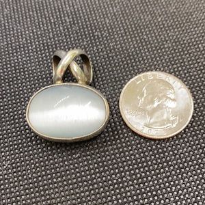 Antique cats eye, sterling silver pendant
